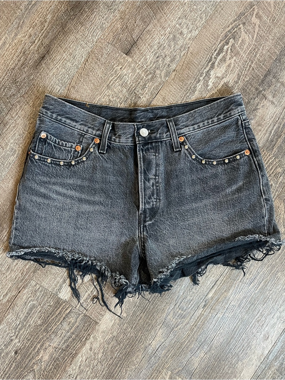 Levi’s washed black silver stud cutoff shorts